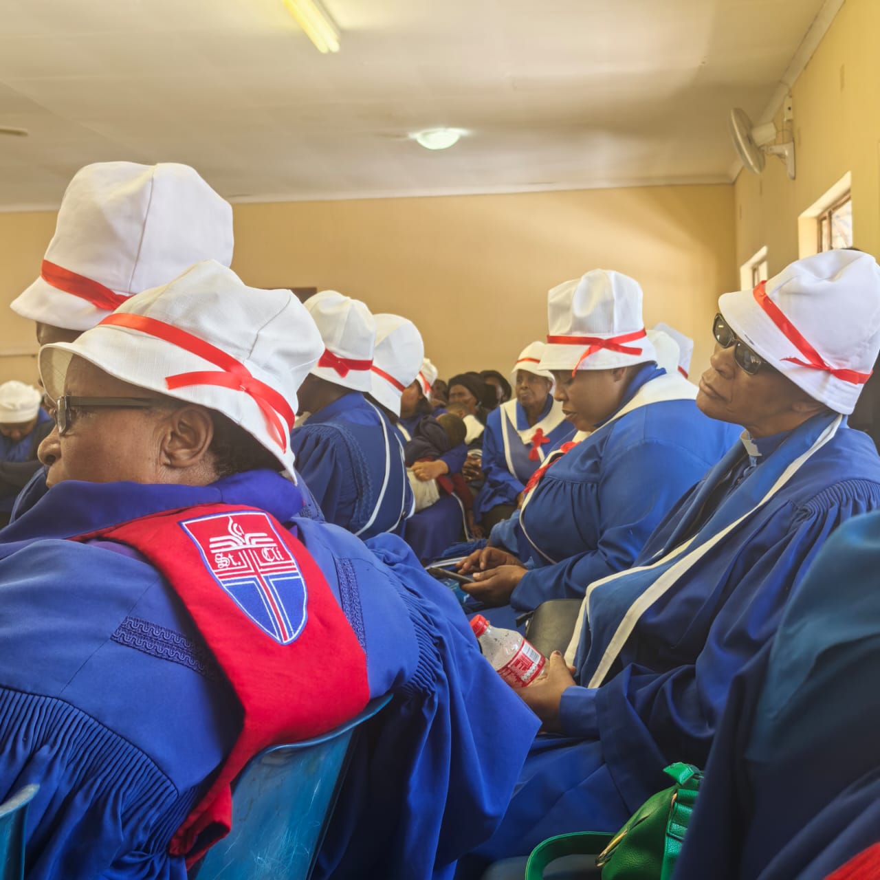 CICSA Women in Blue Robes at Service